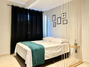 002 - Apartamento monoambiente em lindo residencial com piscina na praia de Bombas